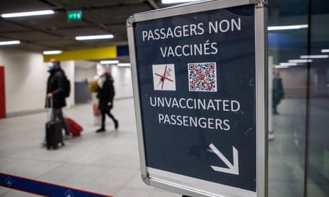 Travellers arrive from an international flight at Paris-Charles de Gaulle airport, France, last month.