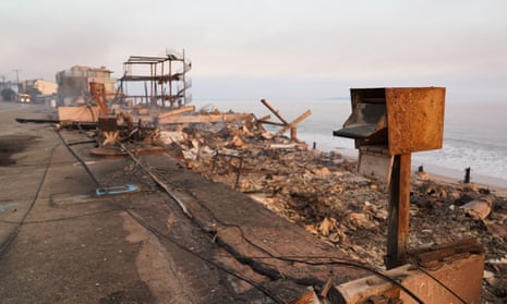 A mailbox stands by houses burned down in the Palisades Fire along the Pacific Coast Highway in Malibu, California, January 9, 2025. (Photo by Cecilia SANCHEZ and Cecilia Sanchez / AFP) (Photo by CECILIA SANCHEZCECILIA SANCHEZ/AFP via Getty Images)