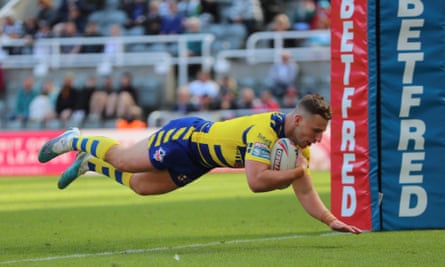 Warrington’s George Williams goes over for a try