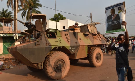 French soldiers patrol on 23 December 2015 in the PK5 Muslim district in Bangui, where the head of the Central African Republic’s armed forces was shot dead on Tuesday.