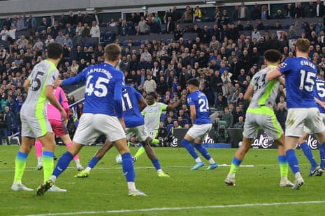 Jeremy Doku of Manchester City scores their side's third goal.