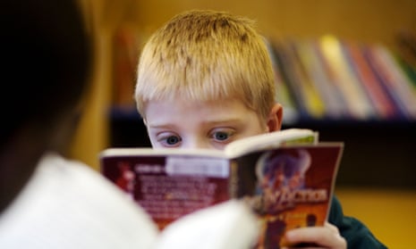 A child reading in the library at a primary school.