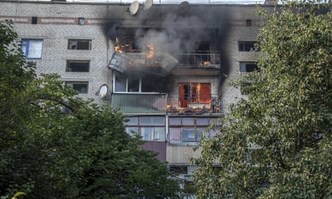 Apartments of a building on fire during heavy shelling in Siversk, Ukraine.
