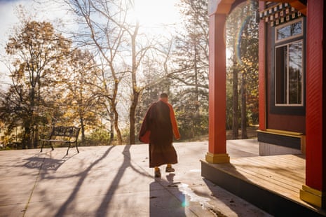 Khentrul Rinpoche walks toward the side entrance to the temple for morning meditation.