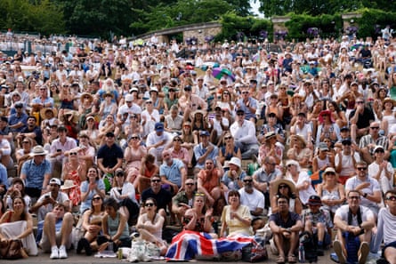 Spectators crowd on to Henman Hill to cheer on Arthur Fery.