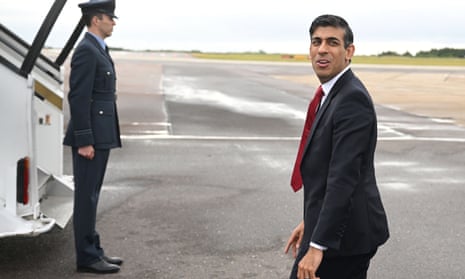 Prime minister Rishi Sunak boards his plane departing to Vilnius, Lithuania, where he is to attend a two-day Nato summit.