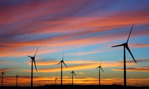 Windfarm against sunset