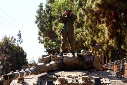 Israeli military vehicles deployed near Israel’s border with Lebanon, in northern Israel.