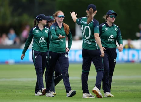 Ireland's Kia McCartney celebrates with teammates after running-out England's Alice Capsey.