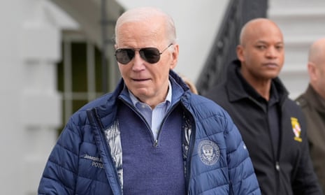Joe Biden walks out of the White House on his way to the Marine One helicopter for departure from the South Lawn of the White House, Friday, April 5. He’s headed to Maryland and the state’s governor, Wes Moore, can be seen behind him, ready to accompany the president on the trip to Baltimore.
