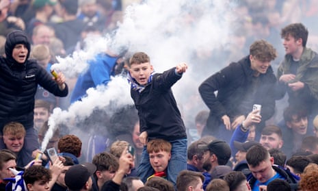 Stockport County supporters celebrate their side’s promotion to League One.