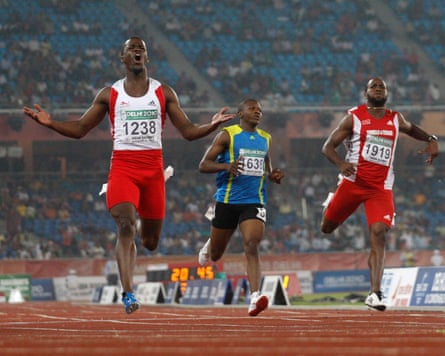 Leon Baptiste (left) wins the 200m final at the 2010 Commonwealth Games