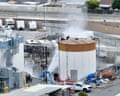 Water is sprayed on the tank that overheated in Garden Grove in Orange county on Friday.