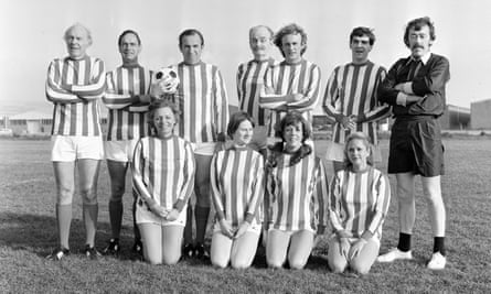 A still from a 1978 episode of Reggie Perrin. Back row: John Horsley, Geoffrey Palmer, Leonard Rossiter, John Barron, Trevor Adams, Bruce Bould, Leslie Schofield. Front row: Pauline Yates, Theresa Watson, Sue Nicholls, Sally-Jane Spencer.