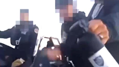 Footage shows French police threatening to use pepper spray on migrants at sea – video