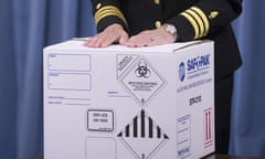 An official demonstrates how Anthrax is shipped to labs.