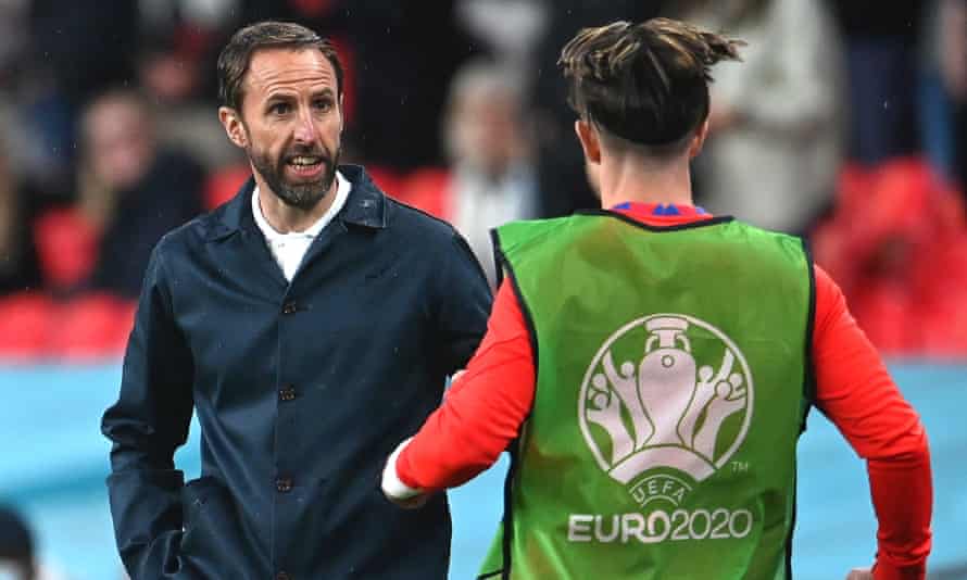 Gareth Southgate gives instructions to Jack Grealish before bringing the playmaker on against Scotland.
