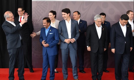 Australia’s Scott Morrison poses with other world leaders, including China’s Xi Jinping (right) at Apec on Sunday. 