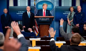 Dr Anthony Fauci, Mike Pence, Dr Deborah Birx and Adm Brett Giroir listen as Donald Trump speaks during a coronavirus taskforce briefing on 17 April.