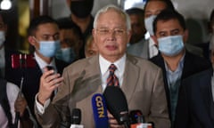 Former Malaysian Prime Minister Najib Razak speaks to the media before he leaves the court in Kuala Lumpur, Malaysia