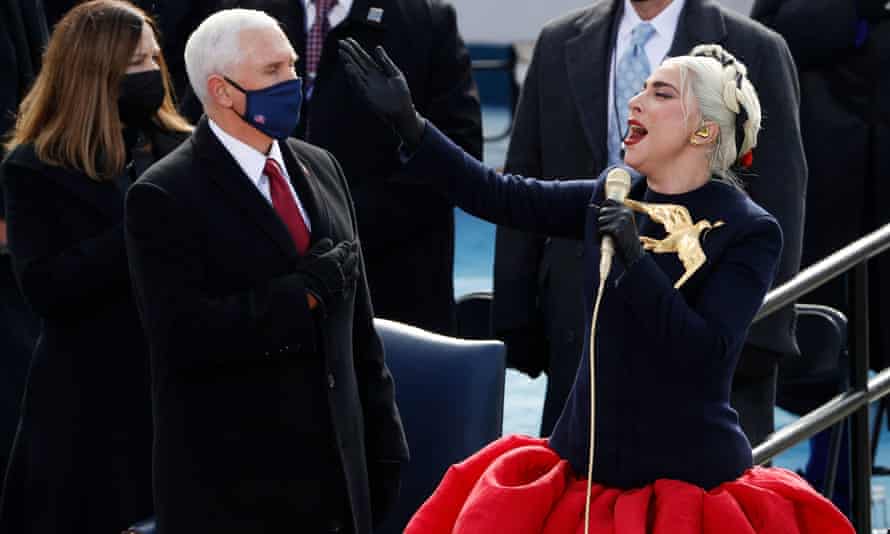 Lady Gaga sings the national anthem as Mike Pence looks on during the inauguration of Joe Biden as president of the United States.