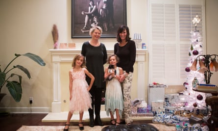 Kasey (right) with Karen (left) and their two daughters.