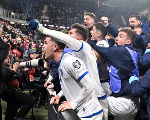 Kosovo players celebrate a goal during the 2026 World Cup qualification play-off semi-final against Slovakia in Bratislava
