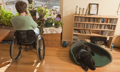 Woman in a wheelchair at home