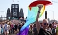 People take part in pride march over the Sydney Harbour Bridge in March 2023.