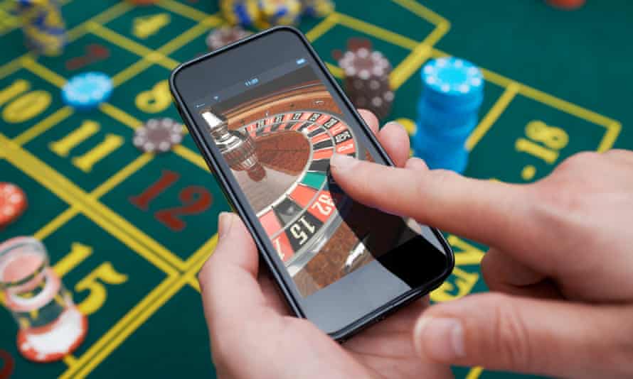 Impose strict curbs on gambling during Covid-19 lockdown, MPs urge | Gambling | The Guardian