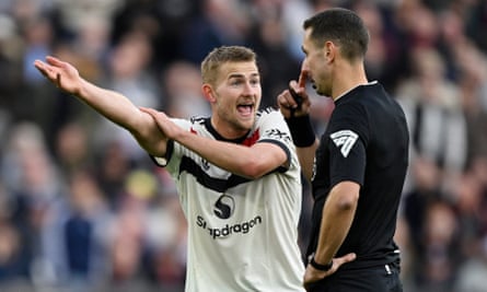 Matthijs de Ligt protests his innocence to David Coote.