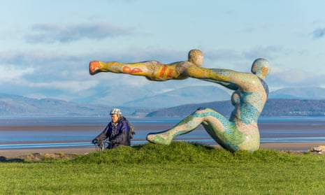 The Venus and Cupid sculpture on Morecambe Promenade at Scalestones Point looking out over the Bay and the Lake District hills.
