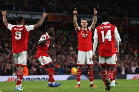 Granit Xhaka points at the fans and celebrates the goal.