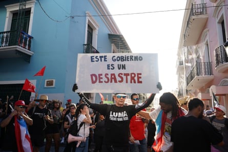 a man holding a sign
