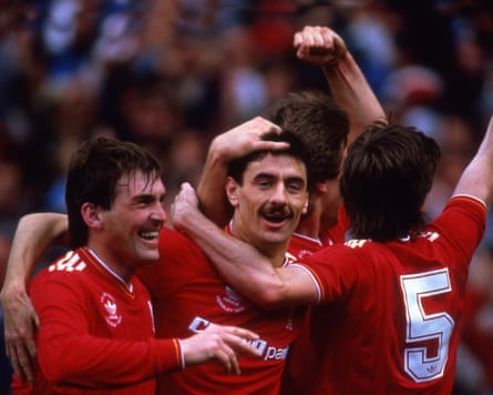 Ian Rush celebrates a goal for Liverpool with teammate Kenny Dalglish in 1986.