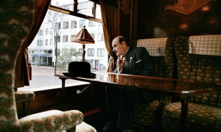 Hercule Poirot, played by Martin Gaisford, in a carriage from the Orient Express.