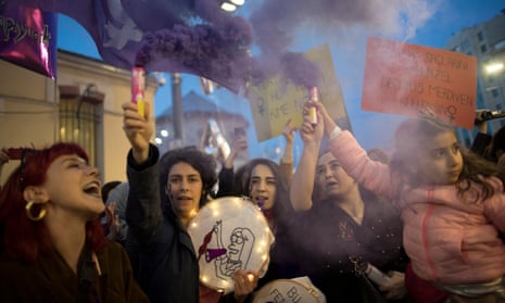 Thousands of women shout slogans as Turkish police block the roads during a rally marking the International Women’s Day at Istiklal Street in Istanbul, Turkey