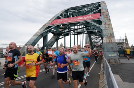 View from one end of Tyne Bridge as runners head towards the camera