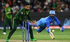 Dinesh Kartik dives for the crease during the T20 World Cup match between India and Pakistan in 2022.