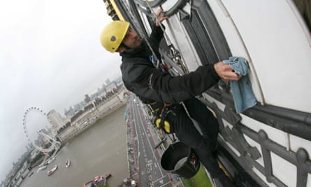 Allan Davies, a technician, cleaning Big Ben clock.