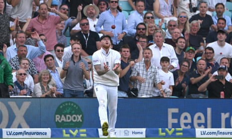 England's Ben Stokes takes a catch to dismiss Australia's Pat Cummins off the bowling of Joe Root.