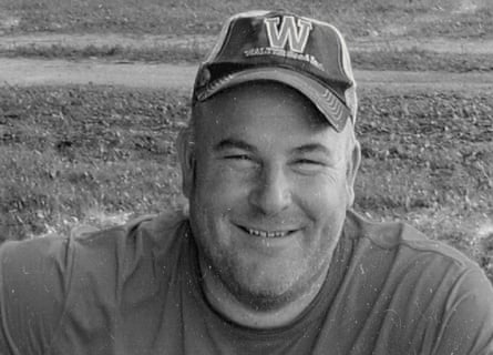 Man in cap smiles