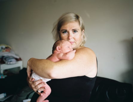 Debbie holds her newborn baby, Anderston, Glasgow. That first journey home from the hospital, depending on which area home is, has a profound impact on health, well being and life expectancy.