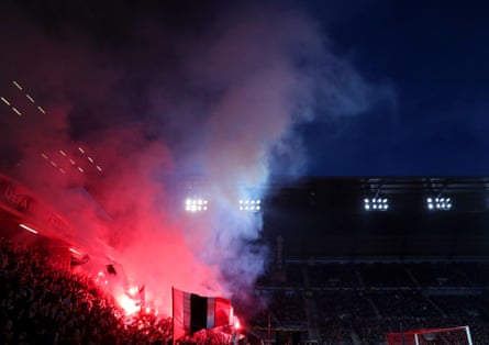 Rennes fans light flares during the Europa League match against Arsenal on 7 March 2019.