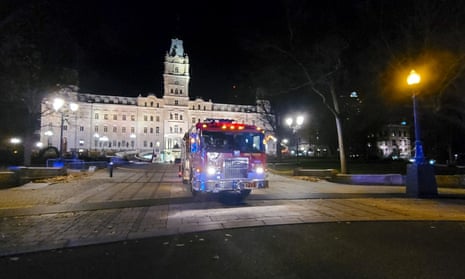 A fire engine is parked in front of the National Assembly in Quebec City after two people were killed in an attack
