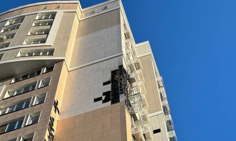 The damaged facade of an apartment block in Belgorod, Russia, after a suspected drone attack last month