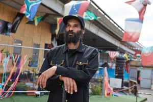 ‘This is a war zone’: Niles ‘Asheber’ Hailstones at Aklam Village near Portobello Road, where he helps survivors of the Grenfell Tower tragedy