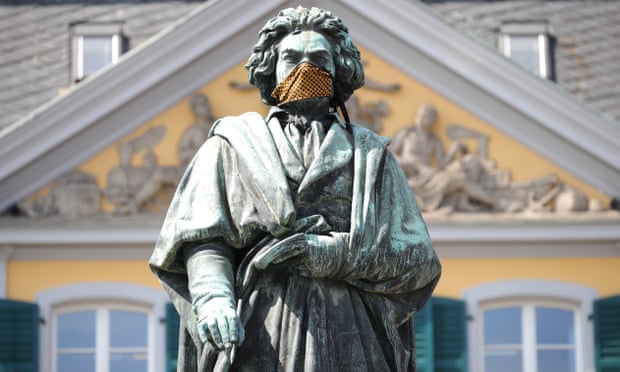 ‘Love at first listen’ ... the Beethoven monument in Bonn, Germany, given a timely face mask.