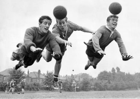 Dennis Viollett, Bobby Charlton and Johnny Giles practice heading during Manchester United training in 1960