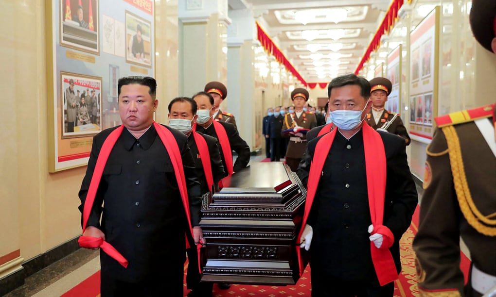 North Korean leader Kim Jong-un (left) carries Hyon Chol-hae’s casket during his funeral service in Pyongyang